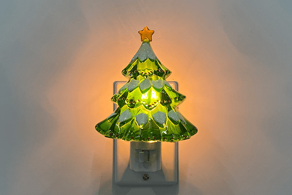 Is the Plug-In Christmas Tree Night Light energy-efficient?